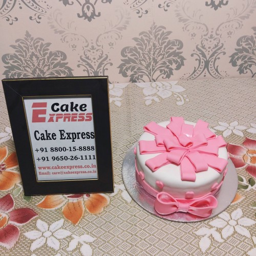 Pink Bow Truffle Fondant Cake Delivery in Delhi NCR