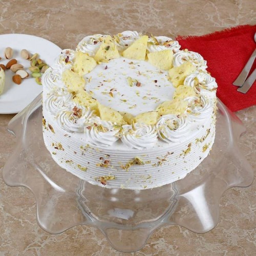 Vanilla Flavored Pista Rasmalai Cake Delivery in Delhi