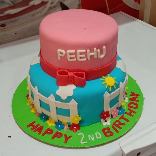 Firm Theme 2 Tier Cake Delivery in Delhi NCR